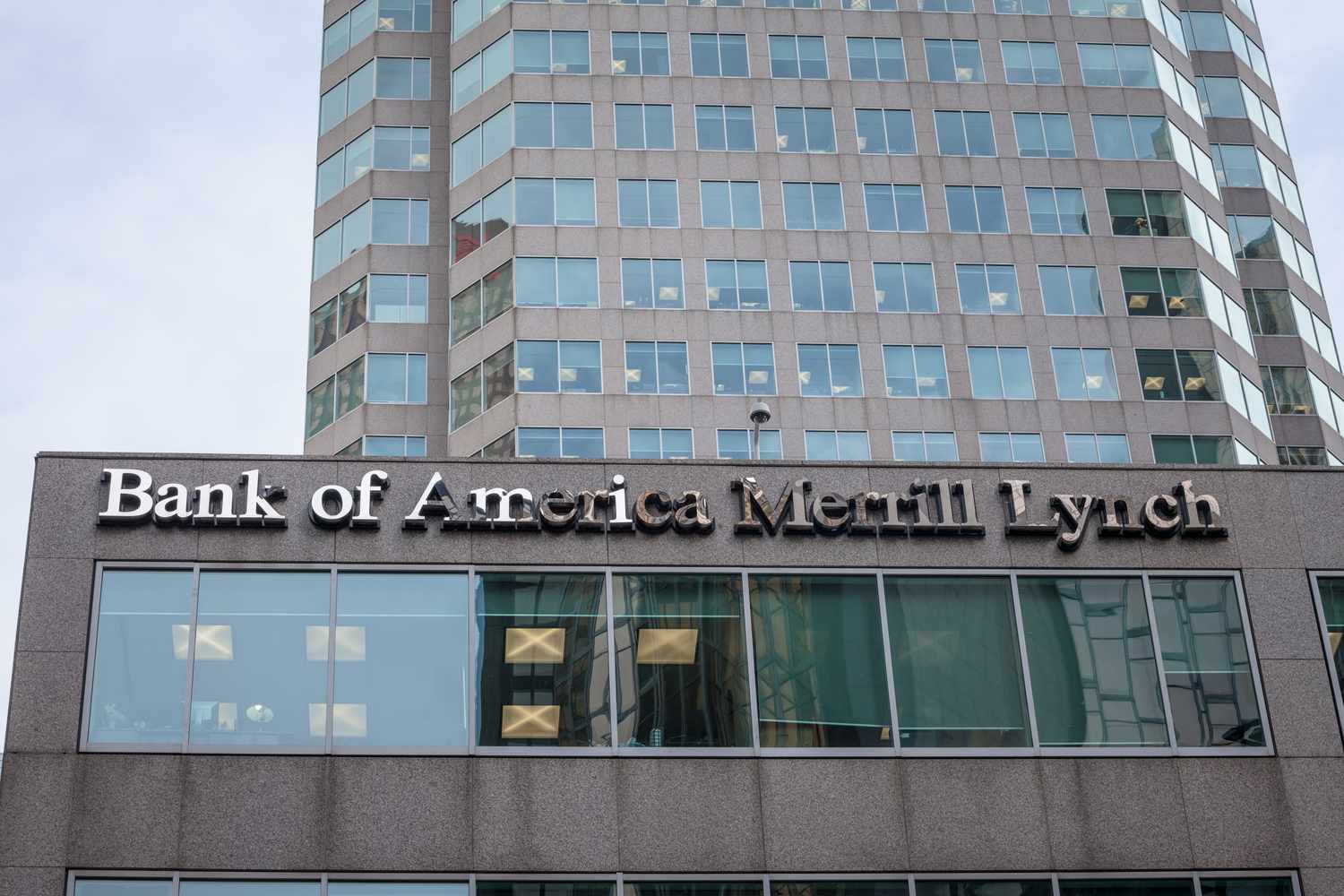 Picture of a sign with the logo of Bank of America Merill Lynch on the main office of the company in dowtown toronto, Ontario