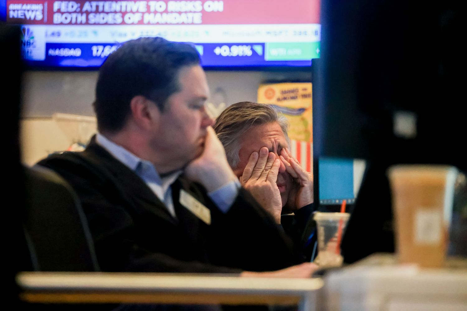 Traders work on the floor of the New York Stock Exchange on March 19, 2025