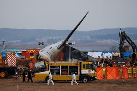The wreckage of the Boeing Co. 737-800 aircraft operated by Jeju Air in Muan County, South Korea, on Sunday, Dec. 29, 2024.