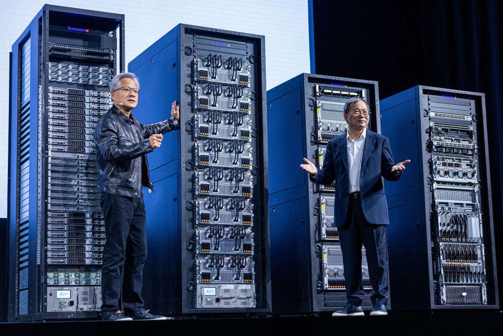 Charles Liang, chief executive officer of Super Micro Computer Inc., right, and Jensen Huang, co-founder and chief executive officer of Nvidia Corp., during the Computex conference in Taipei, Taiwan, on Wednesday, June 5, 2024.