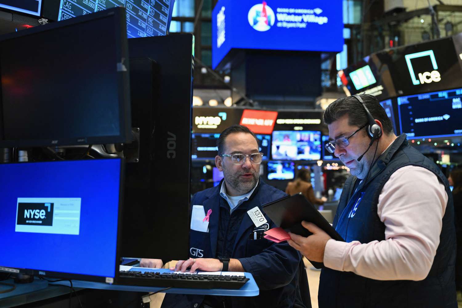 Traders work on the floor of the New York Stock Exchange (NYSE).