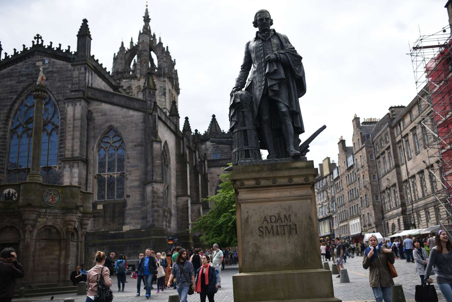 A statue of Scottish economist Adam Smith stands on the Royal Mile in Edinburgh, Scotland.