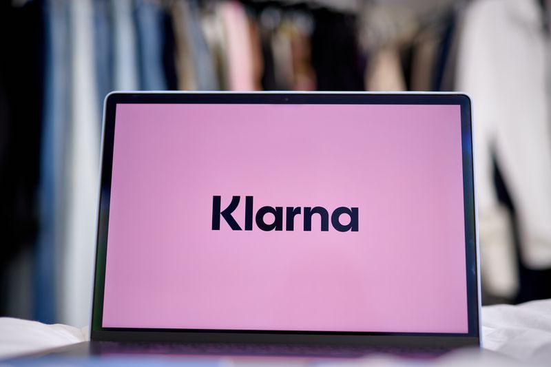 The Klarna logo on a laptop computer