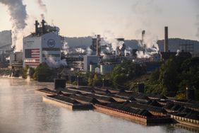 Coal on barges on the Monongahela River near the United States Steel Corp. Clairton Coke Works facility in Clairton, Pennsylvania.