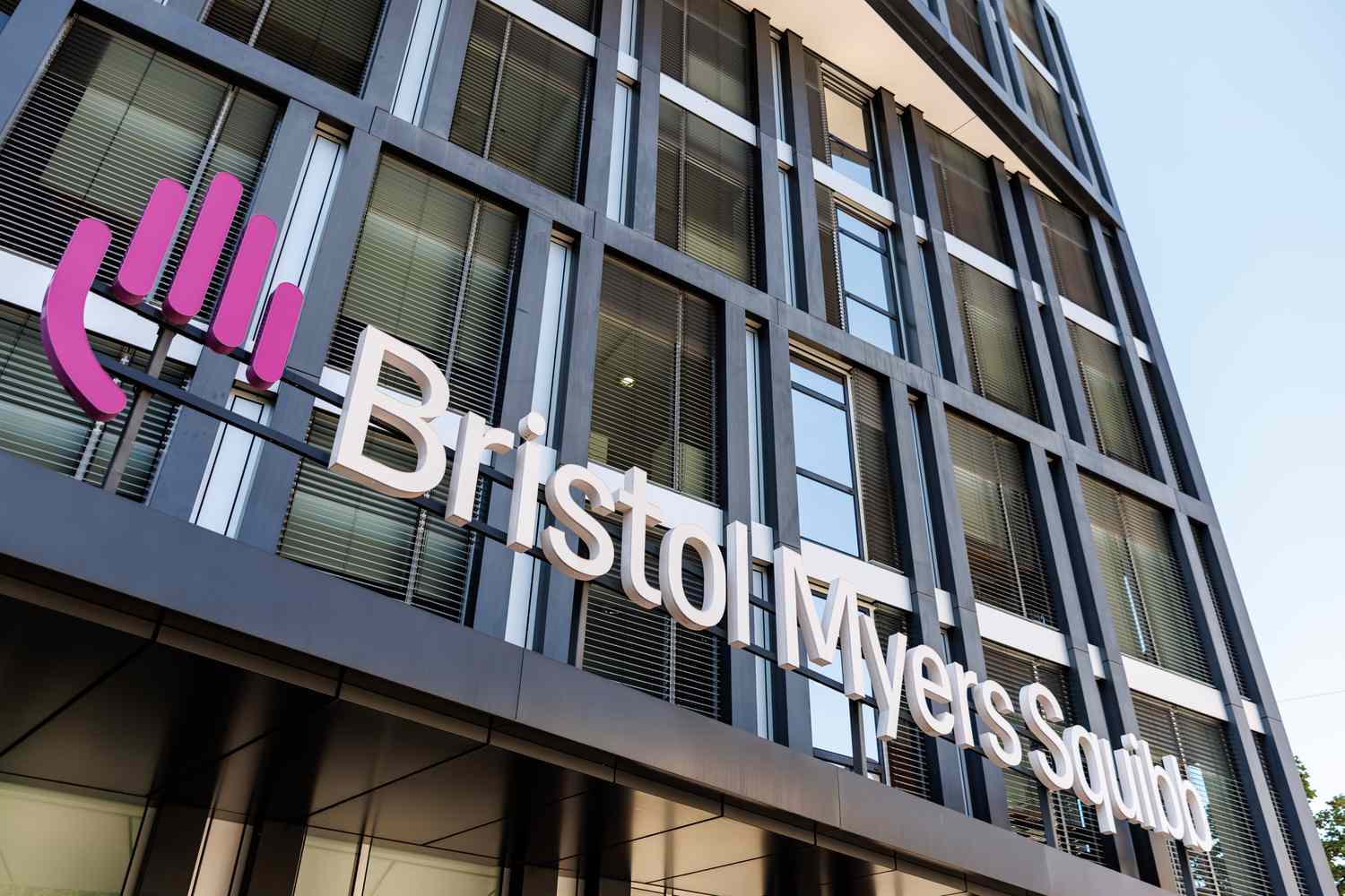 The logo of the pharmaceutical company Bristol-Myers Squibb is seen on the facade of the company's Munich, Germany, headquarters on August 29, 2024