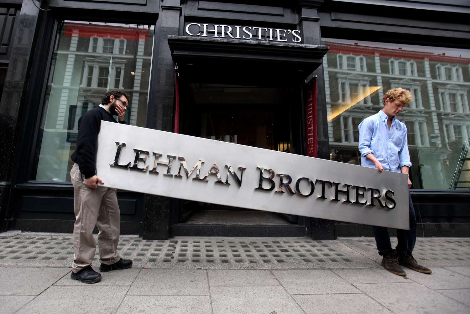 Lehman Brothers sign being removed