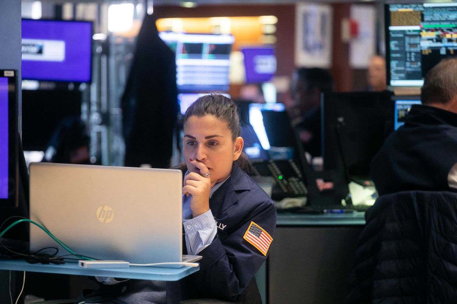 A trader works on the floor of the New York Stock Exchange (NYSE) in New York, US, on Friday, Oct. 20, 2023.