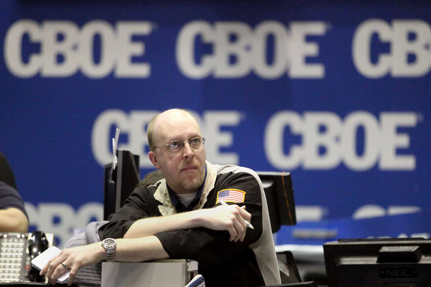 An options trader watches for the release of the CBOE Volatility Index