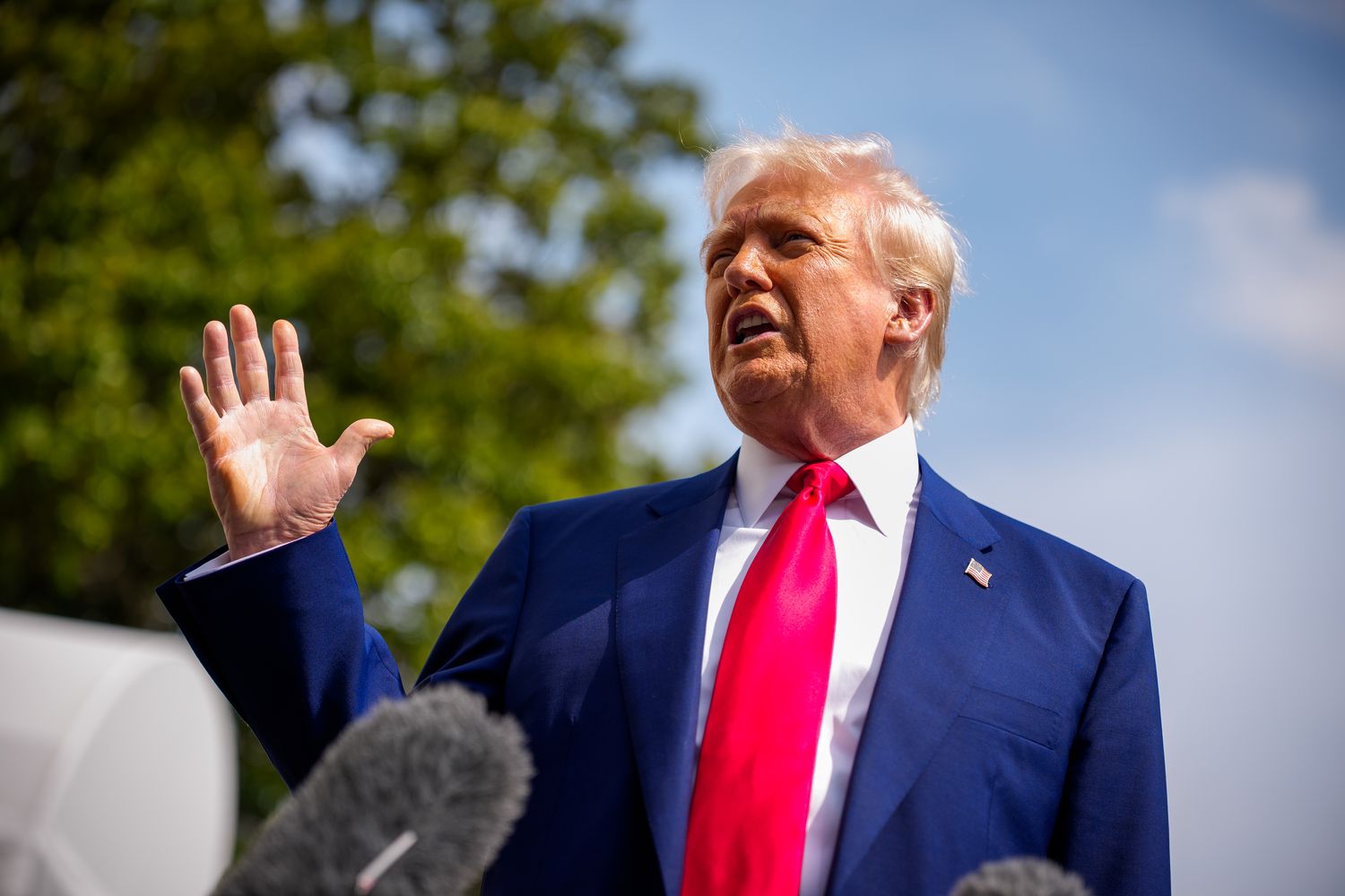 U.S. President Donald Trump speaks to members of the media before boarding Marine One on the South Lawn of the White House on April 3, 2025 in Washington, DC. 