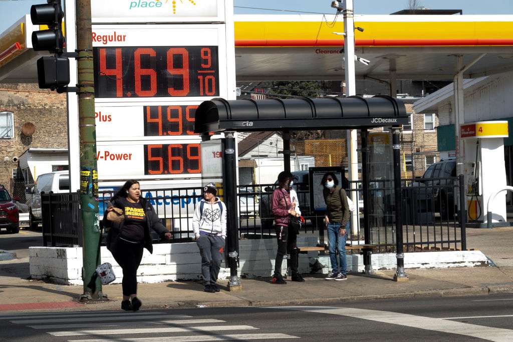 Gas prices are displayed at a gas station on March 12, 2024 in Chicago, Illinois. Gas prices climbed 3.8% percent in February after falling 3.3% the previous month.