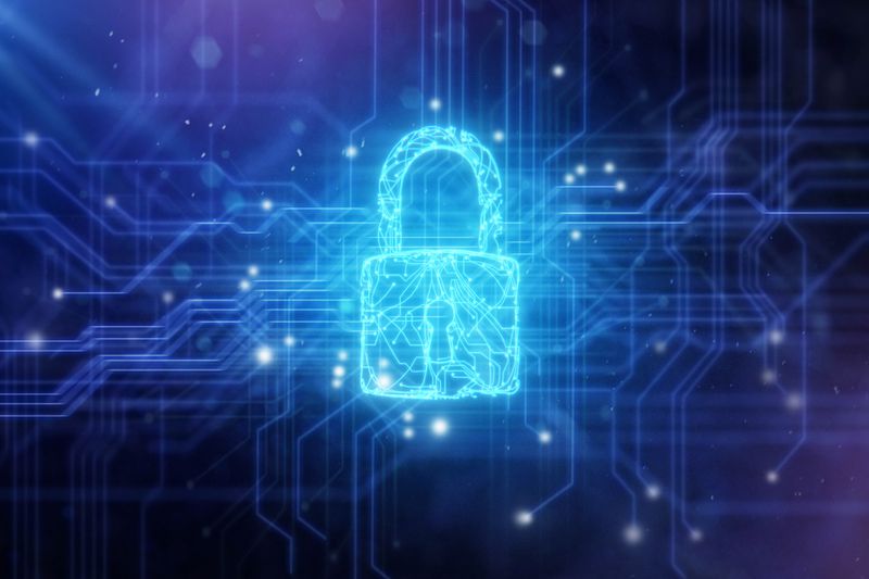 A security padlock in circuit board background.