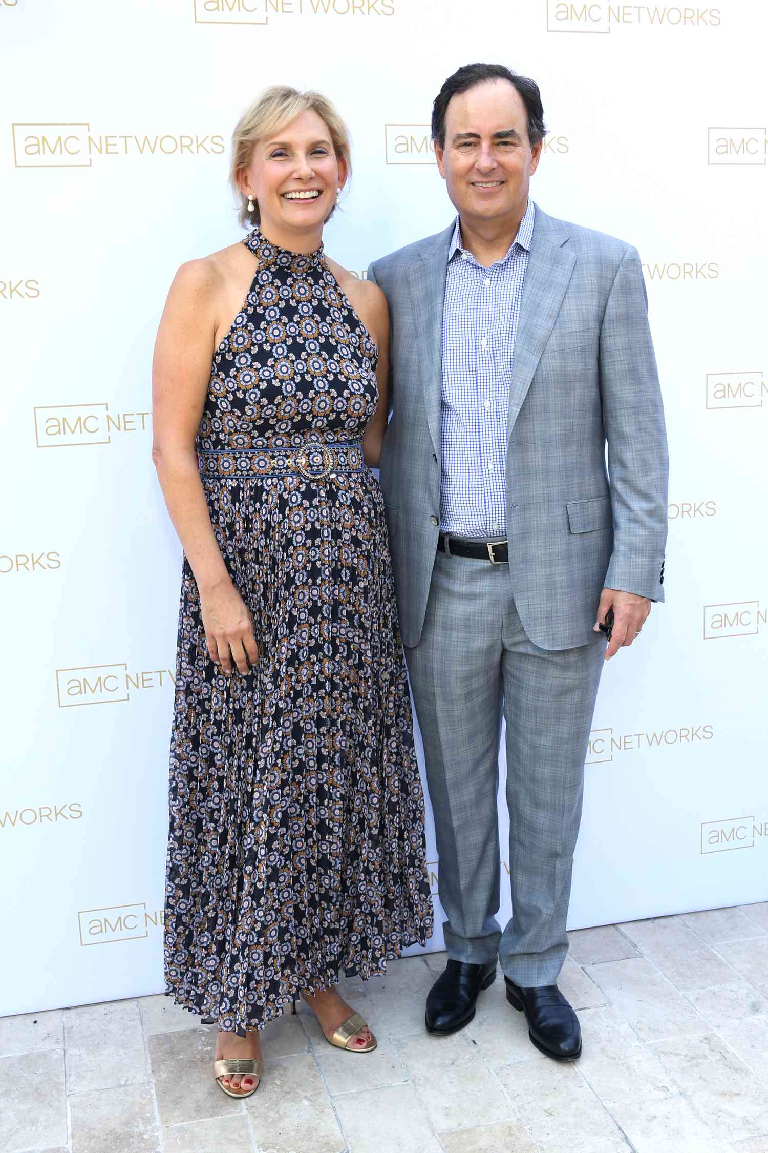 Christina Spade and Dan McDermott standing together at an event