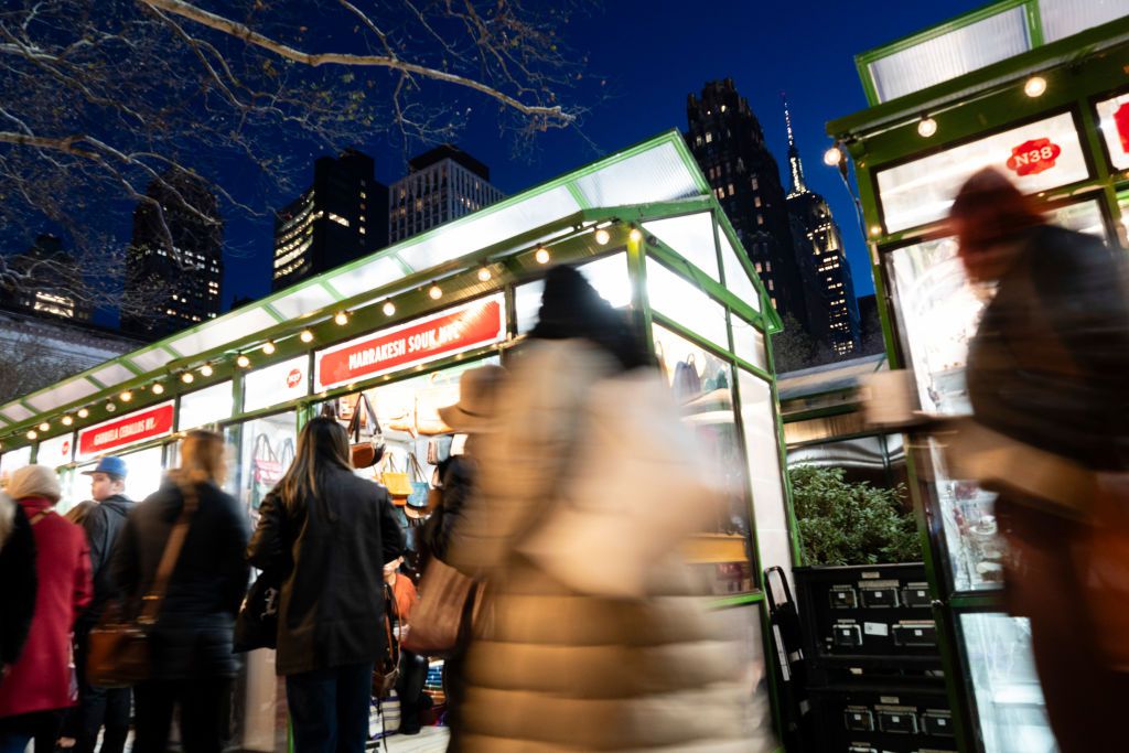 Shoppers at the Bryant Park Winter Village Holiday Market in New York, US, on Saturday, Dec. 16, 2023.