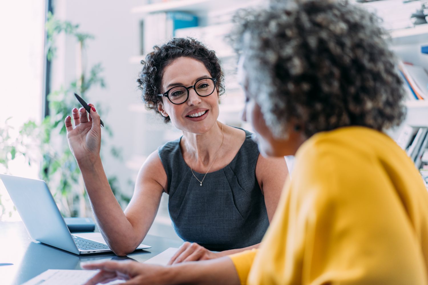 Shot of two women in a business meeting.