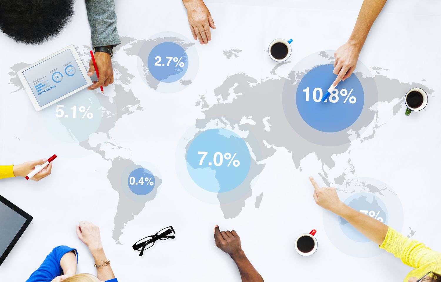 Group of business people discussing global market.