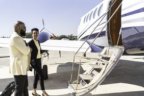 Colleagues boarding into flight in a corporate jet