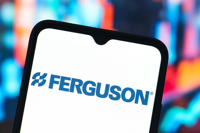 Ferguson Enterprises logo is seen displayed on a smartphone screen
