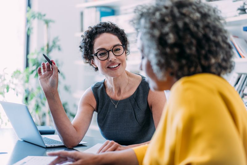 Shot of two women in a business meeting.