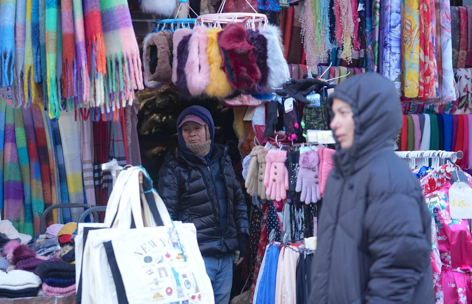 After the first snowfall of the year in New York City, United States, the freezing cold continues to affect the area, while people carry on with their daily lives on December 23, 2024. 