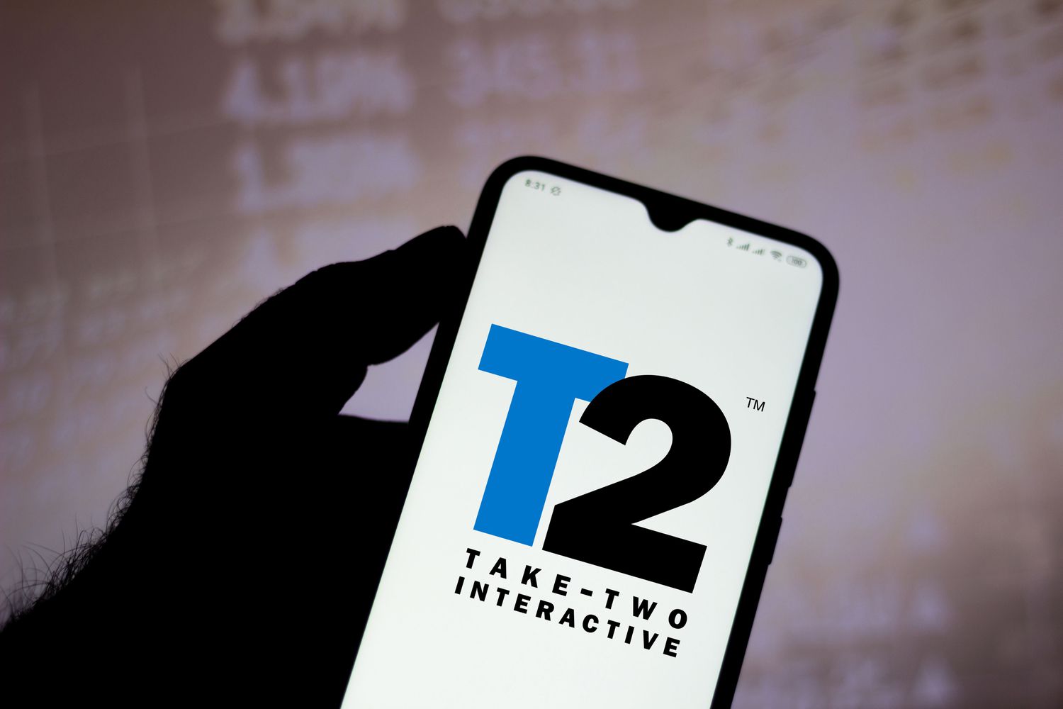Take-Two Interactive's logo displayed on a smartphone