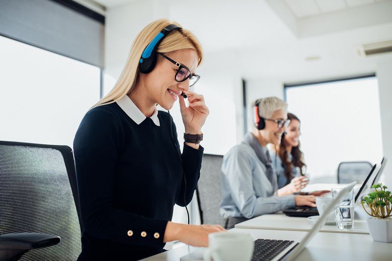 Happy Woman at Call Center