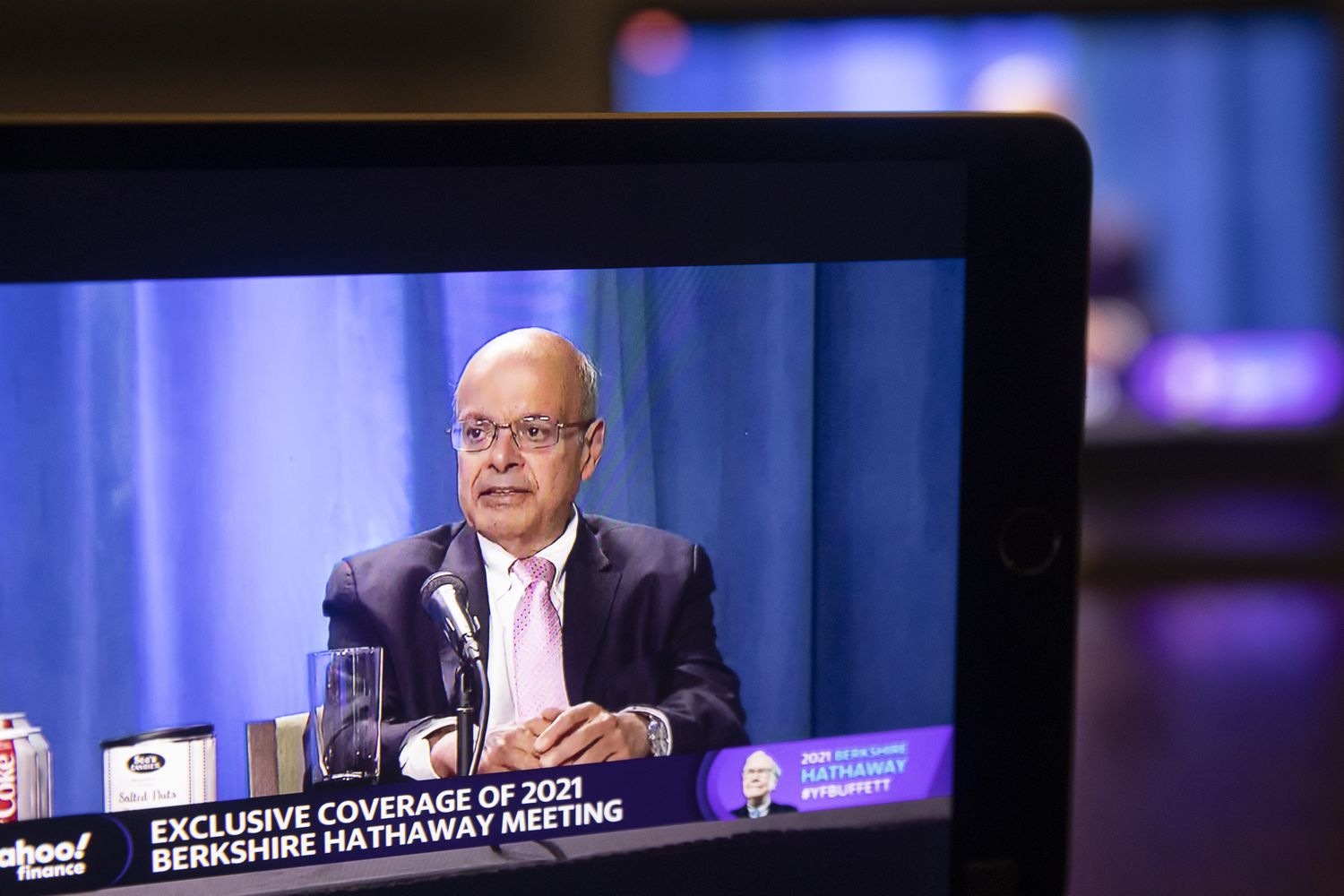 Ajit Jain, vice chairman of insurance ops at Berkshire Hathaway Inc., speaks during the virtual Berkshire Hathaway annual shareholders meeting on a tablet computer in Tiskilwa, Illinois, U.S., on Saturday, May 1, 2021. 