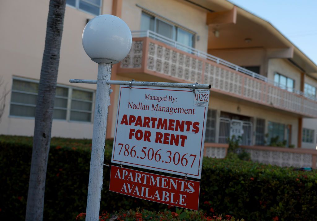 An 'Apartments for Rent' sign hangs in front of a building on December 06, 2022 in Miami Beach, Florida.