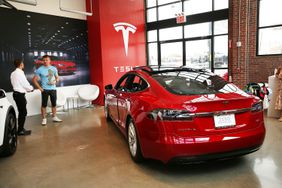 A Tesla Model S in a Tesla showroom.