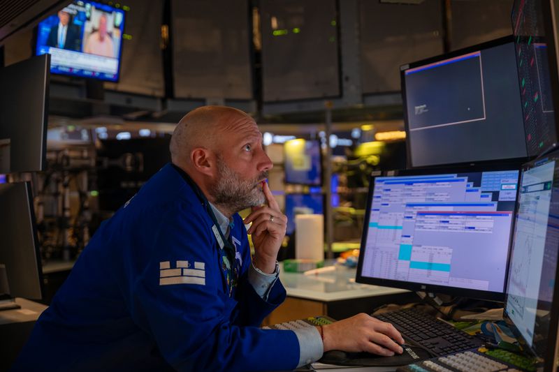 Traders work on the floor of the New York Stock Exchange 