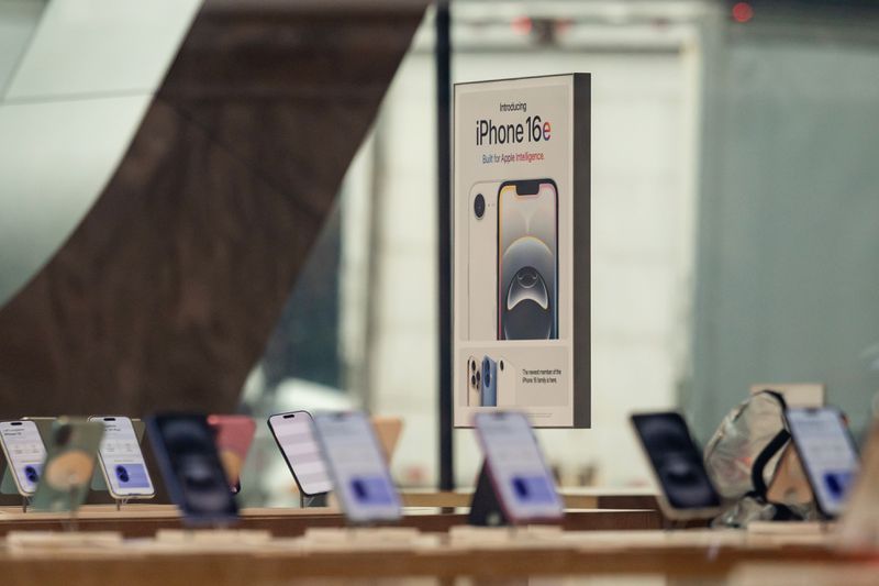 A sign for the iPhone 16e smartphone at an Apple store in the Brooklyn borough of New York, US, on Friday, May 23, 2025