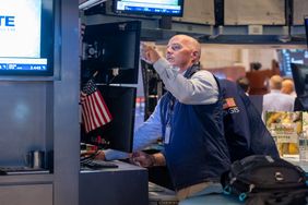Trader on the floor of the New York Stock Exchange