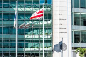 A flag waves outside the U.S. Securities and Exchange Commission building