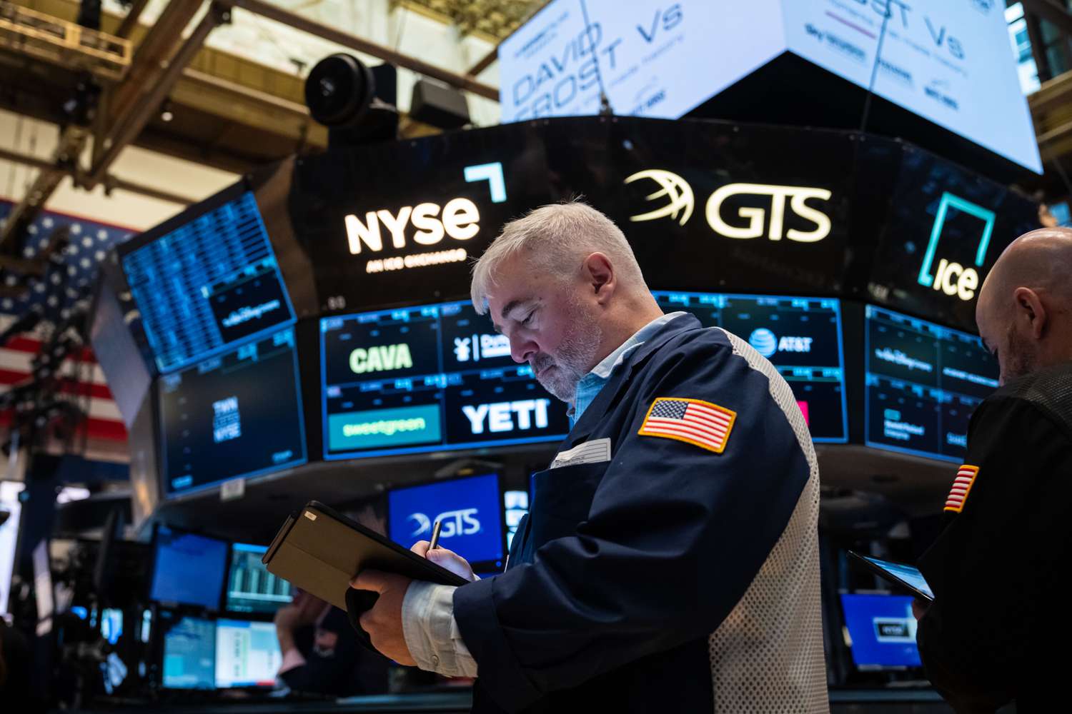 Traders work on the floor of the New York Stock Exchange.