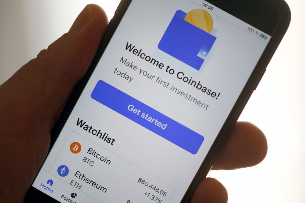 Coinbase app on a smartphone in a hand