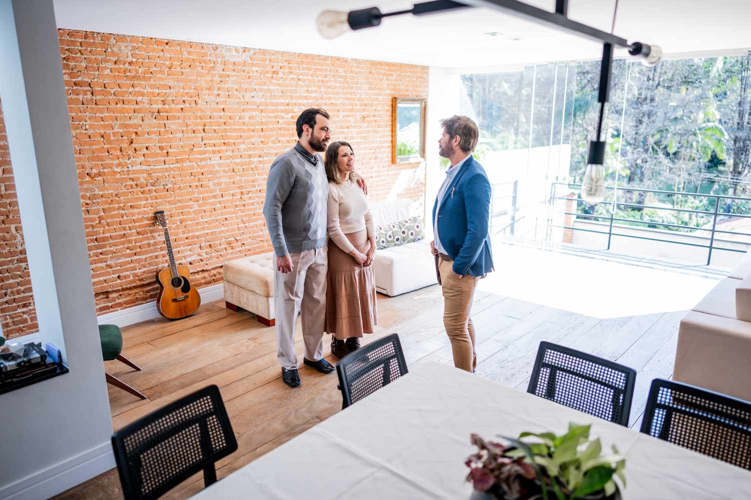 Real estate agent explaining seller-paid points to potential buyers of the property.