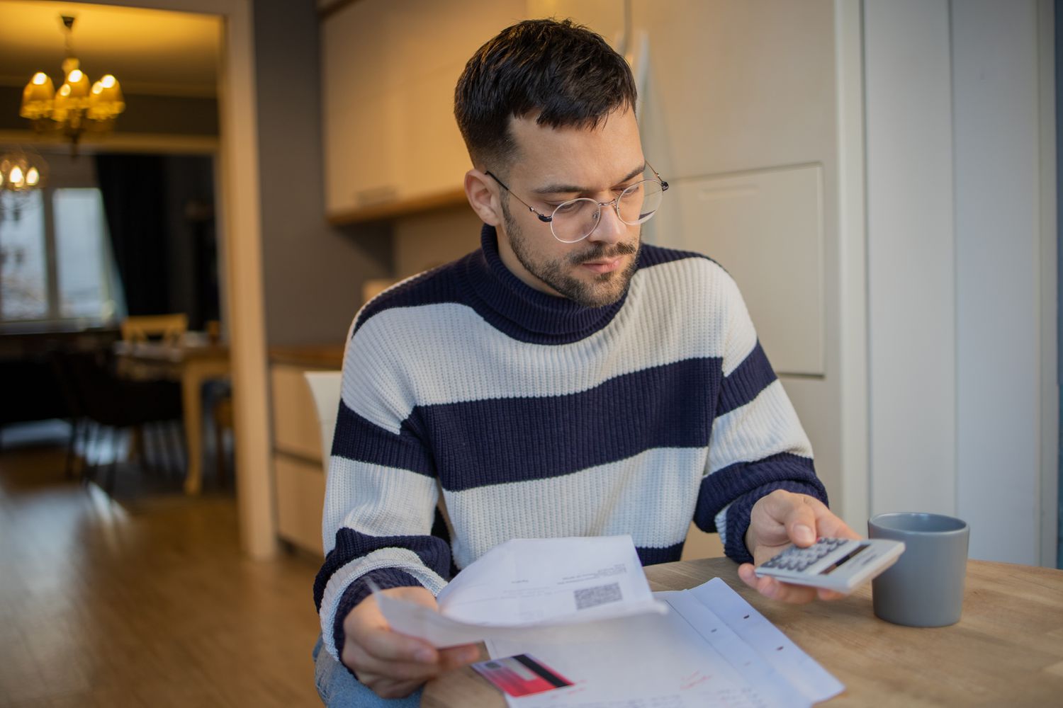 A novice investor looks troubled after reviewing an account statement that shows a value investment has continued to decline in price.