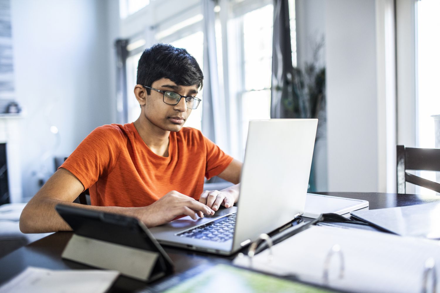 Student working on his laptop