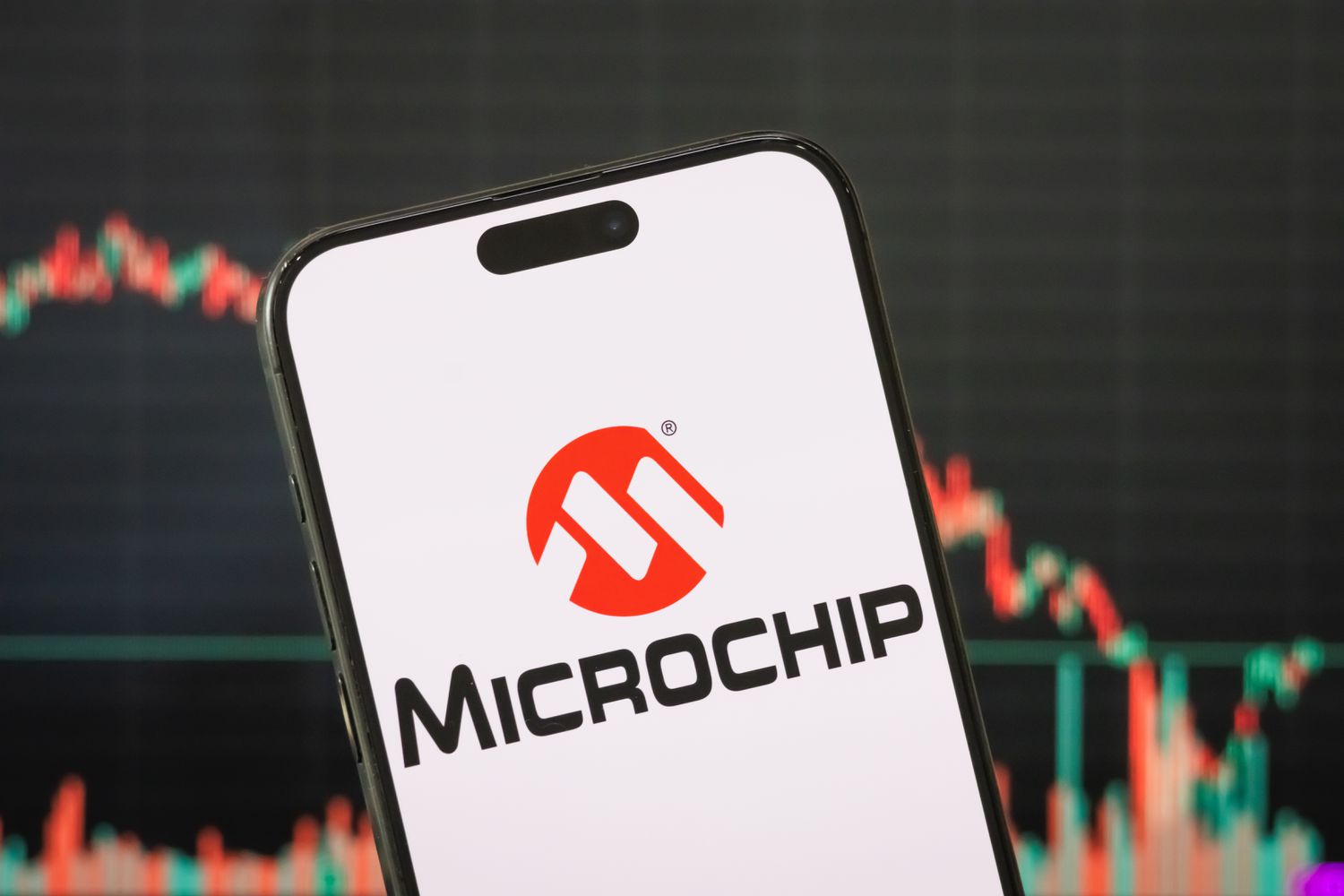Microchip Technology logo on a smartphone screen.