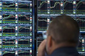 Trader work the floor of the New York Stock Exchange