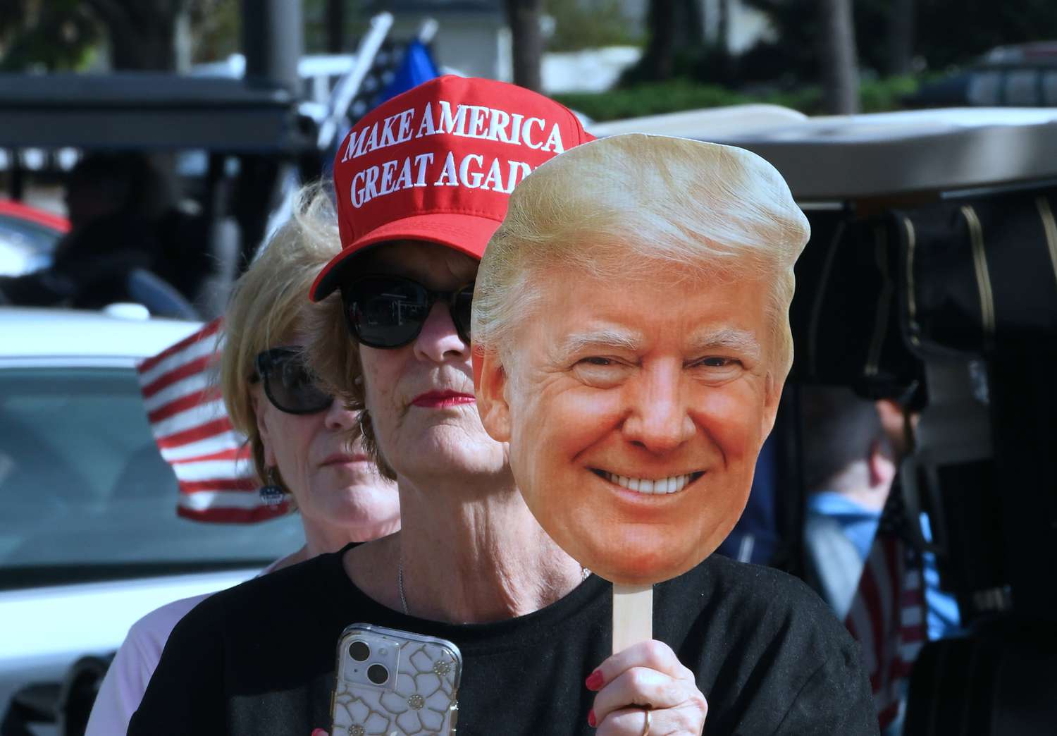 People attend a tailgate victory party and golf cart rally to celebrate the election of former U.S. President Donald Trump as the 47th President of the United States on November 9, 2024 in The Villages, Florida. Trump defeated U.S. Vice President Kamala Harris in the general election on November 5. 