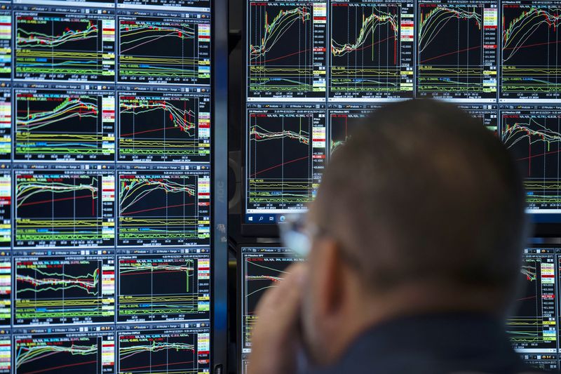 Trader work the floor of the New York Stock Exchange