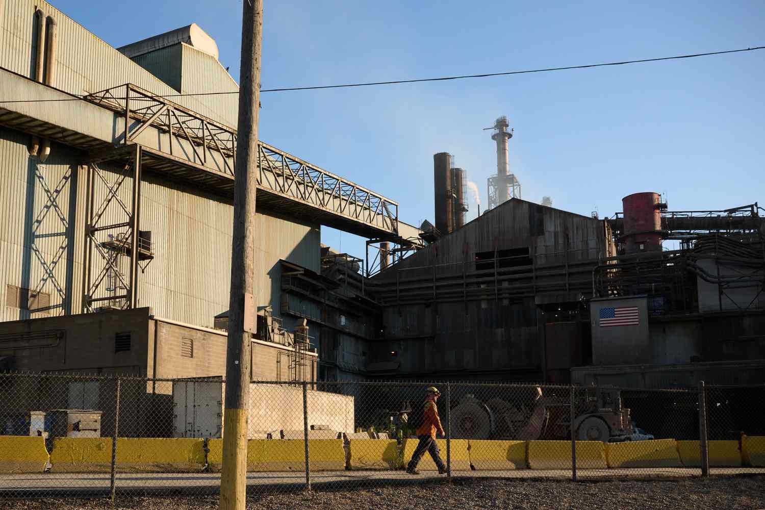 A worker at the Cleveland Cliffs Cleveland Works steel mill facility in Cleveland, Ohio, US, on Monday, Oct. 21, 2024. 
