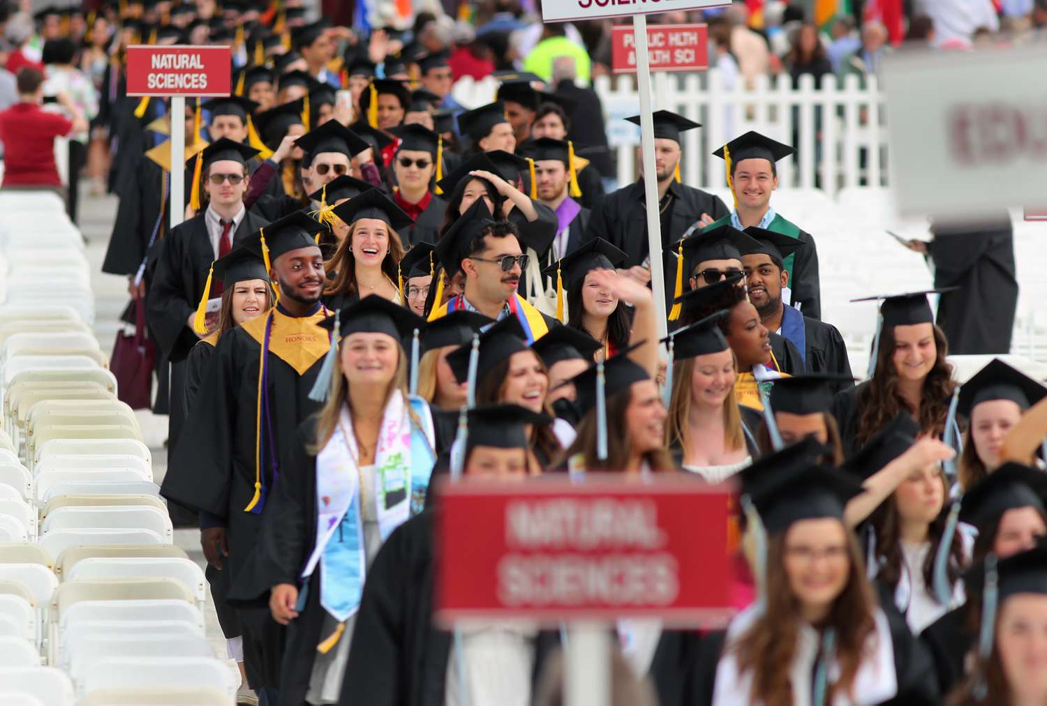  UMass Amherst held their commencement at McGuirk Alumni Stadium. Students march into the stadium.