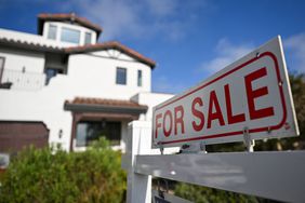 A "For Sale" sign outside a house in Los Angeles in August. 