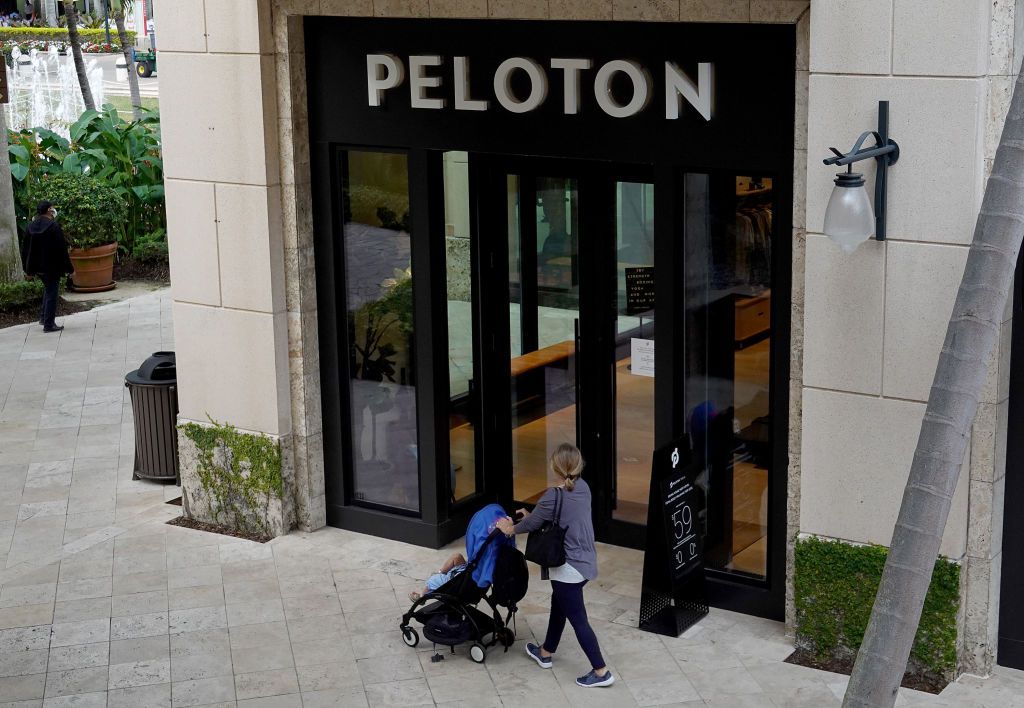 A person walks past a Peloton store on January 20, 2022 in Coral Gables, Florida.
