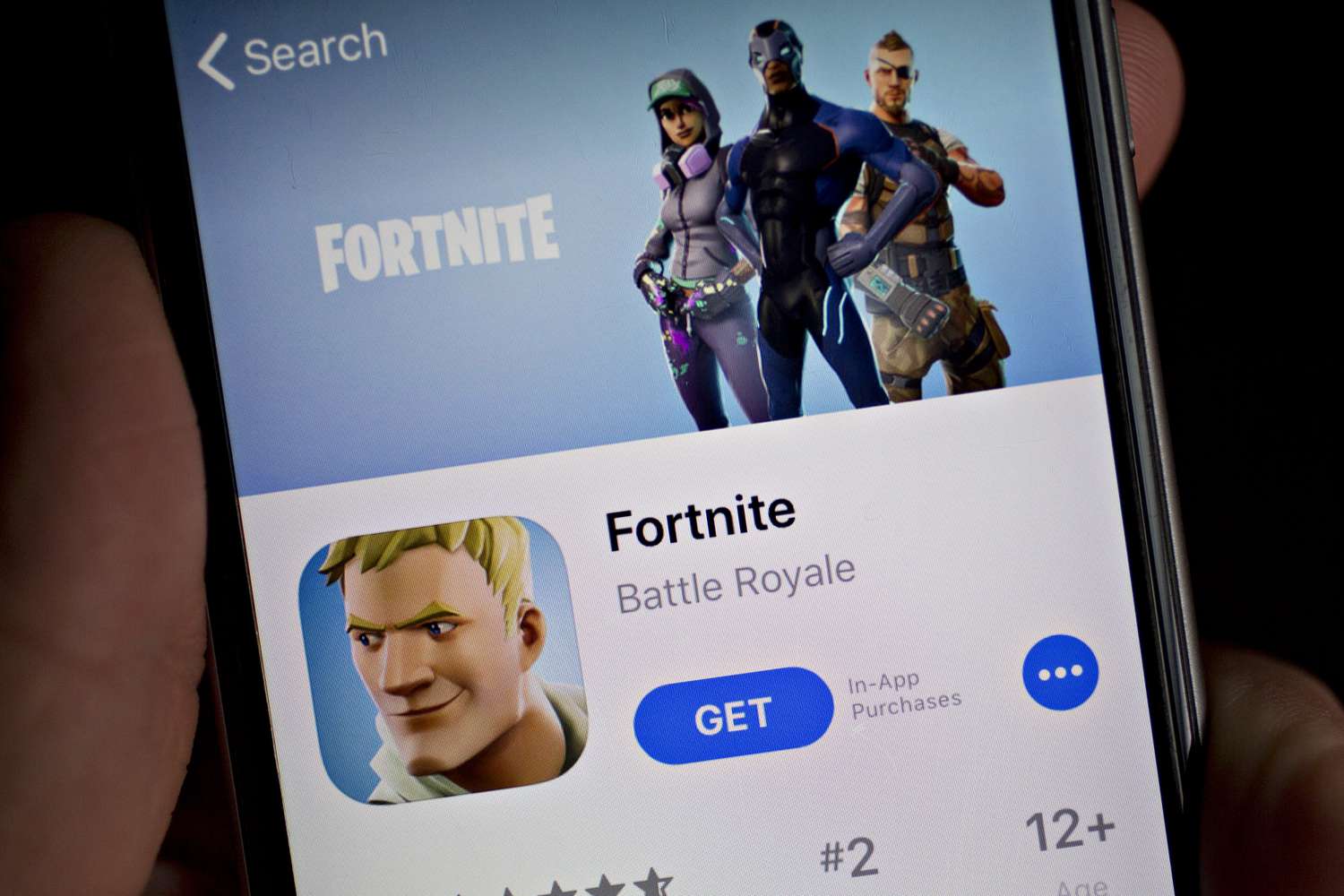 The Apple App Store page for Fortnite is displayed on an iPhone.