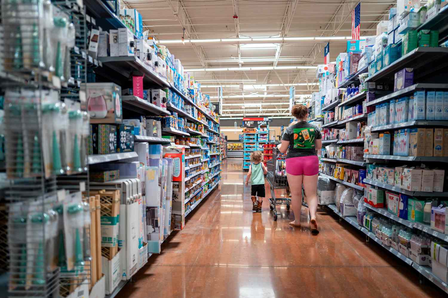A family shops in an Austin, Texas, Walmart store in May. 