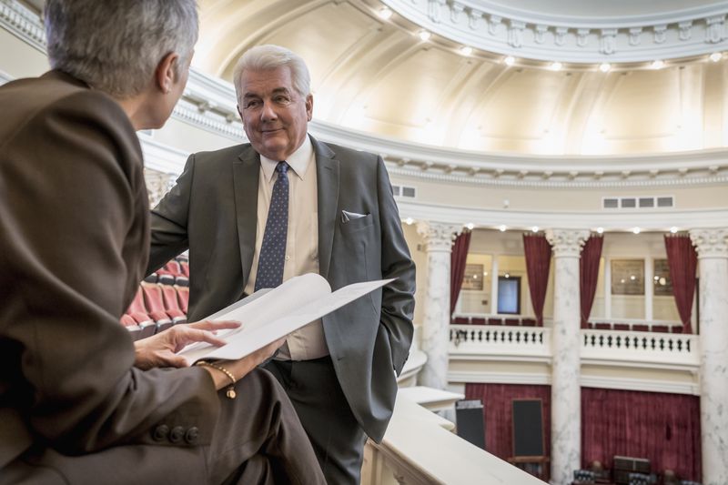 Two politicians talking about the 457 Plan and how it works