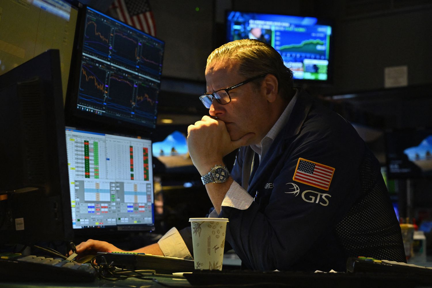Traders works the floors at the New York Stock Exchange (NYSE).