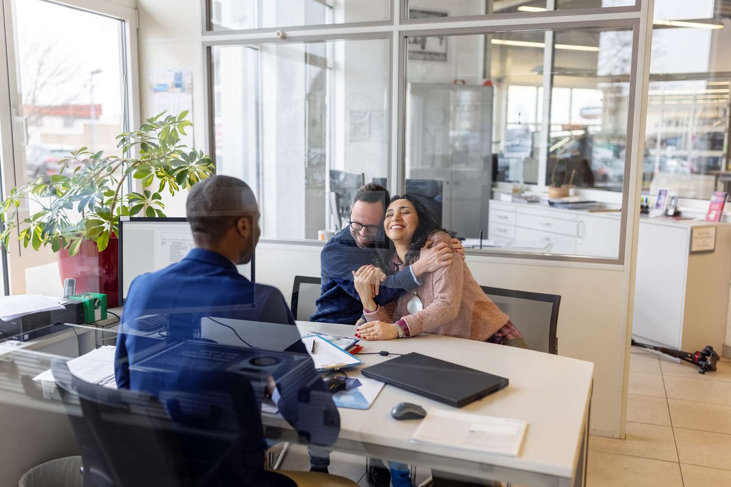 Couple getting approved for a car loan